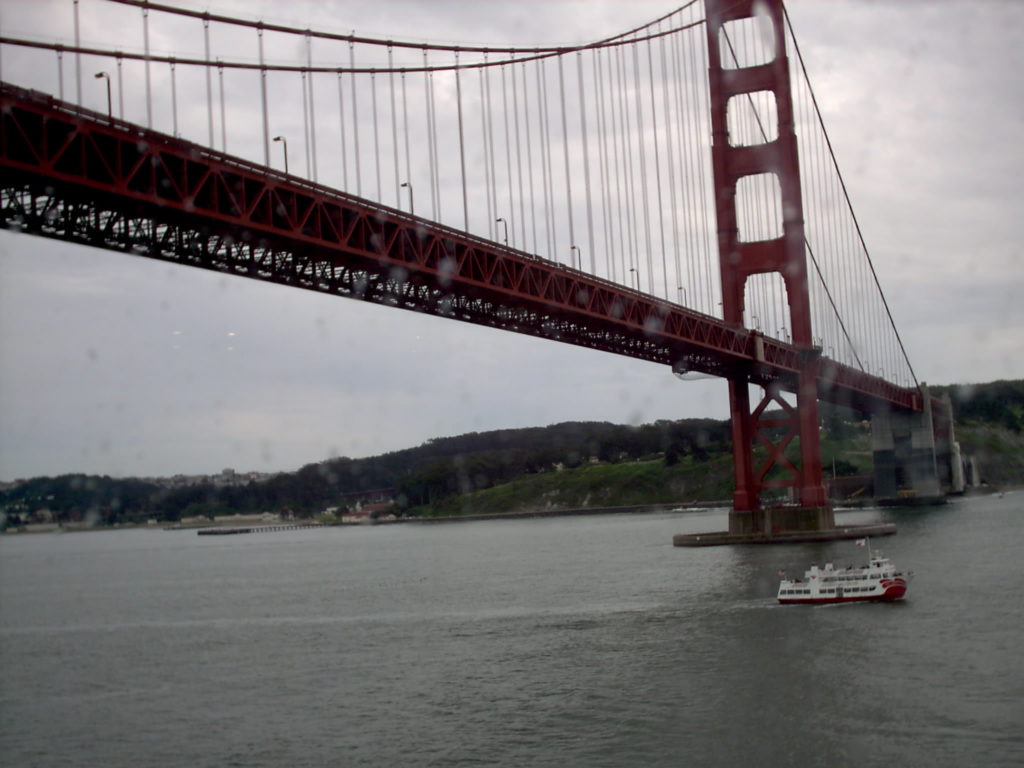 a red bridge over water