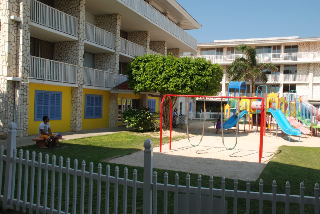 a playground in front of a building