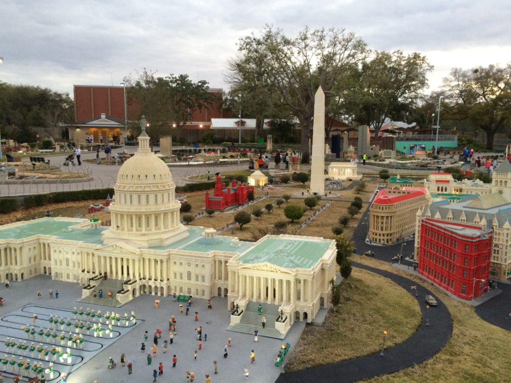 a model of a building with a dome and a monument