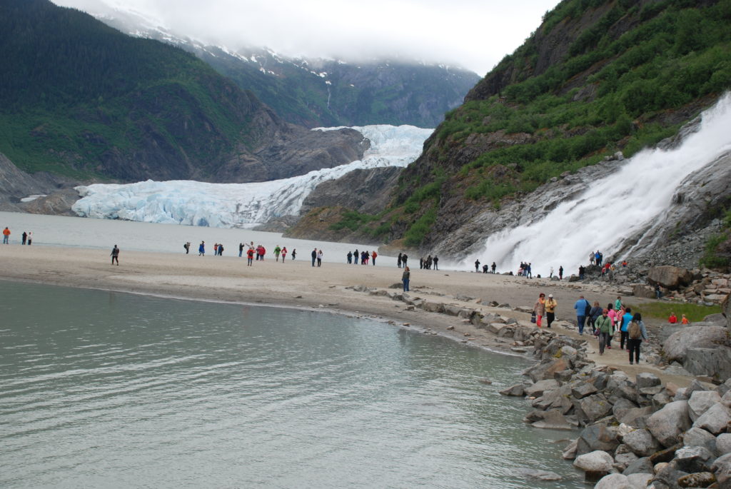 a group of people on a beach