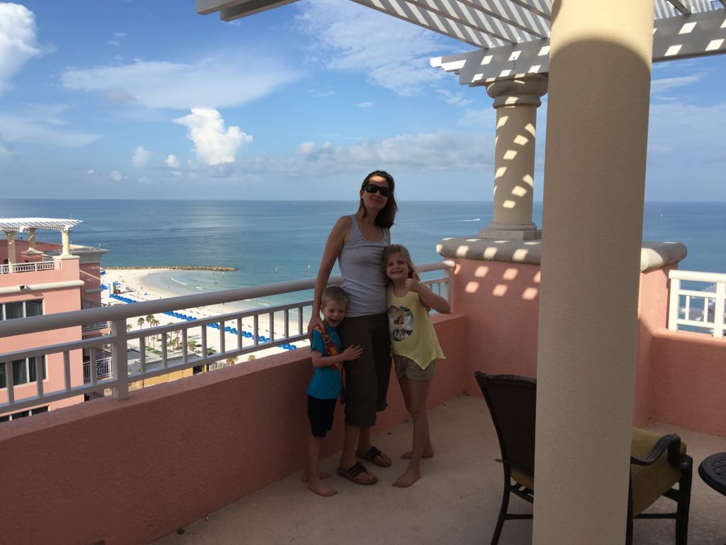 a woman and two children posing for a picture