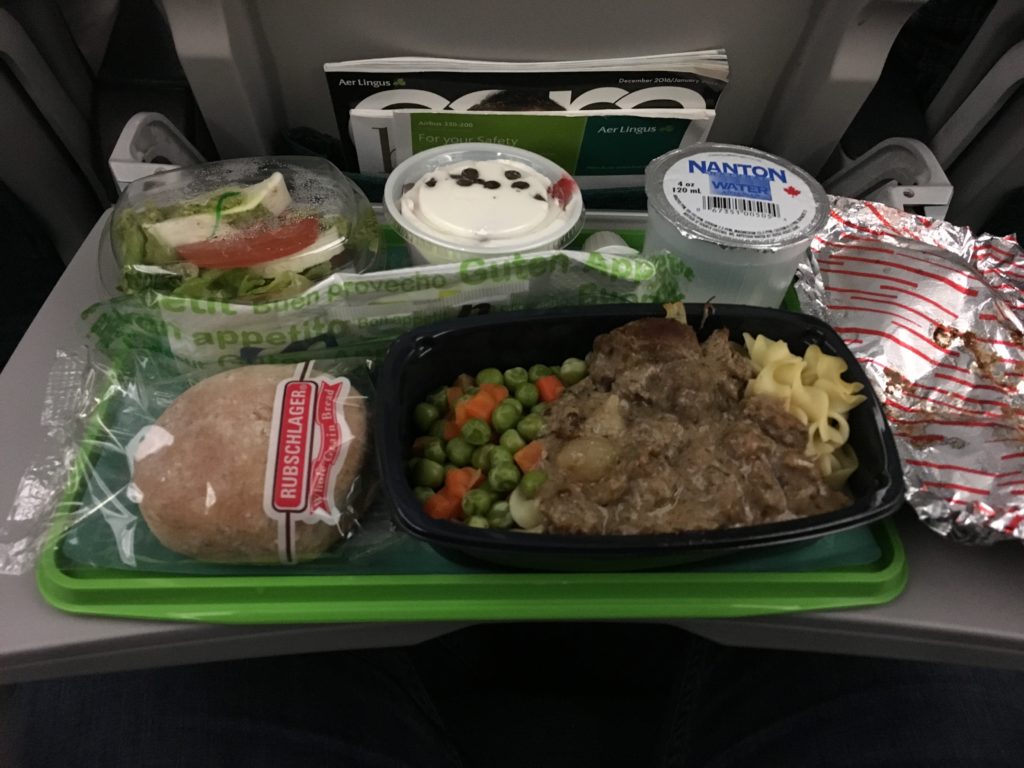 food on a tray on a plane