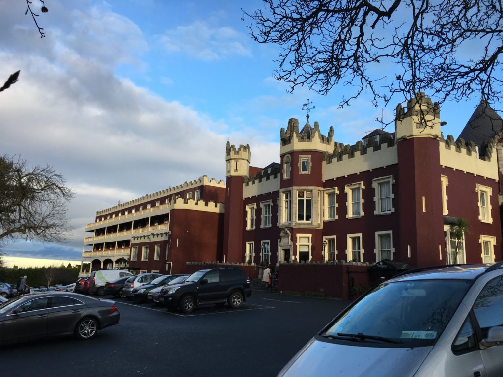 a building with a castle roof
