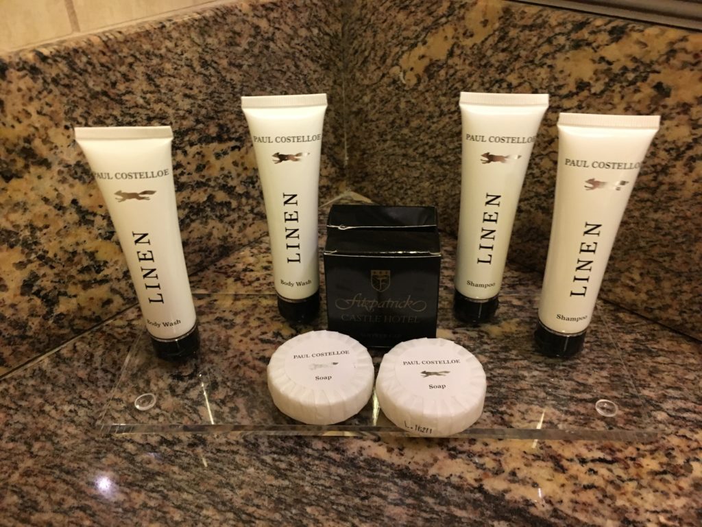 a group of white containers with black text on them
