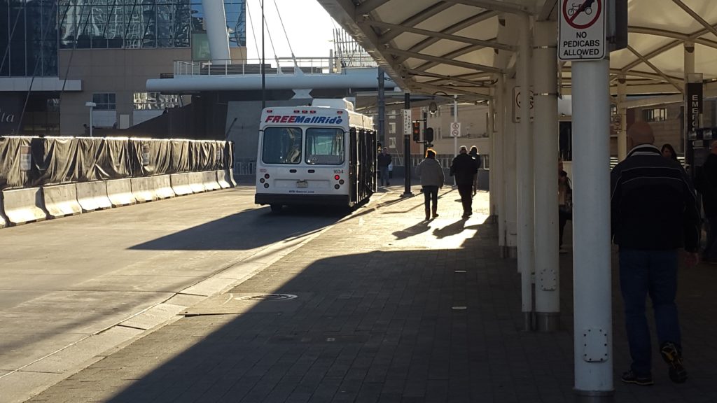 a bus parked on a sidewalk