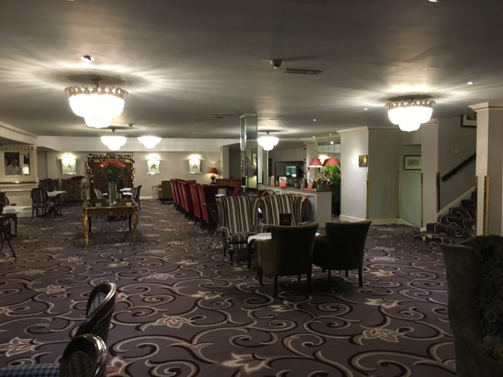 a room with chairs and tables