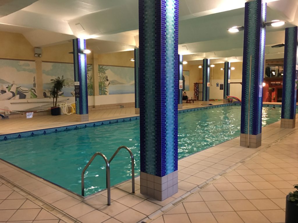 a swimming pool inside a building