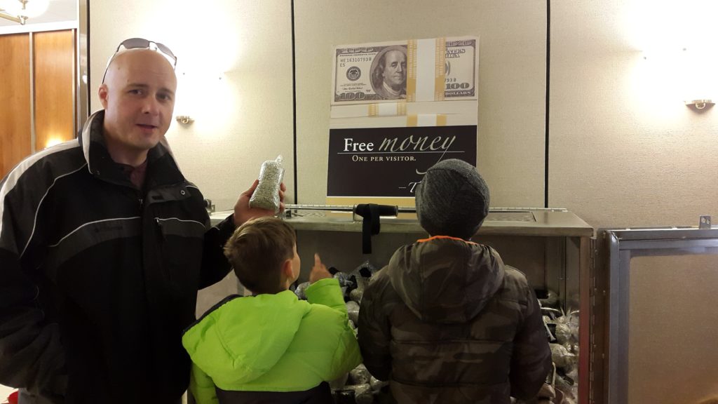 a man holding a bag of money