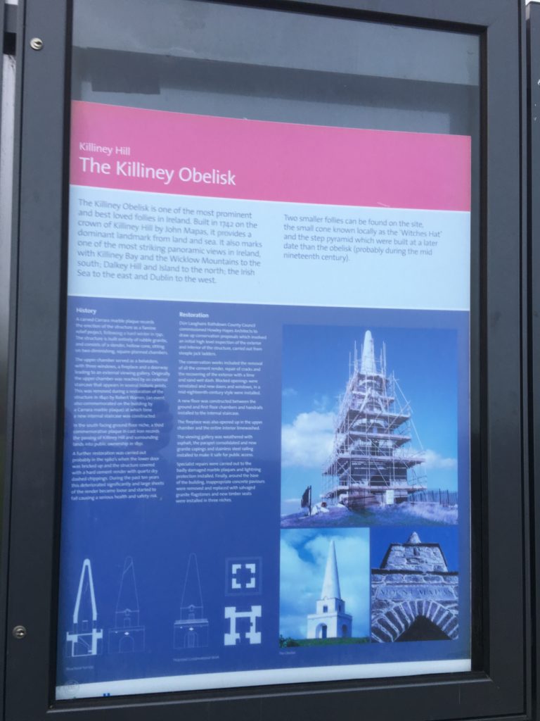 a sign with a picture of a tower
