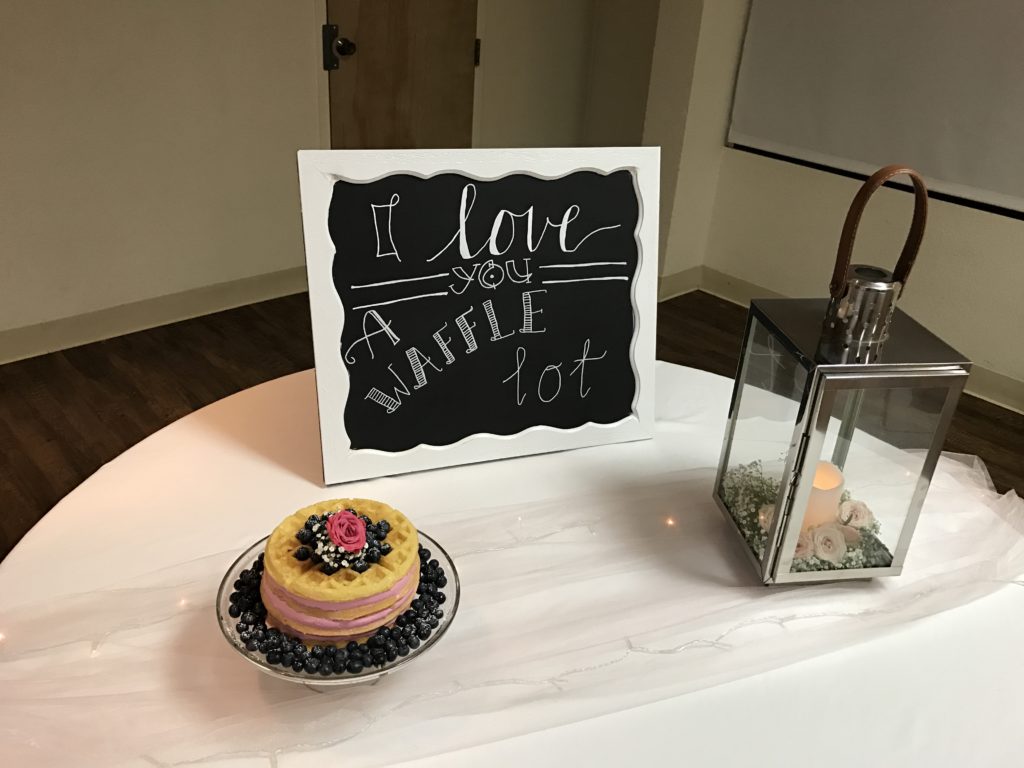 a plate of food and a sign