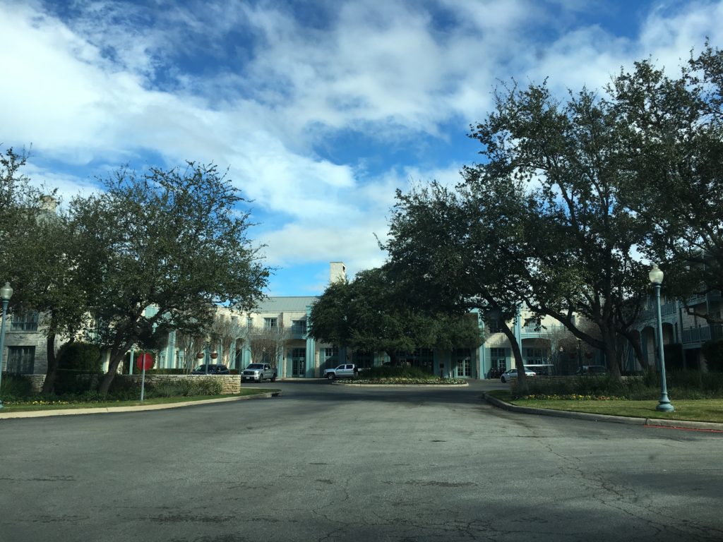 a street with trees and buildings