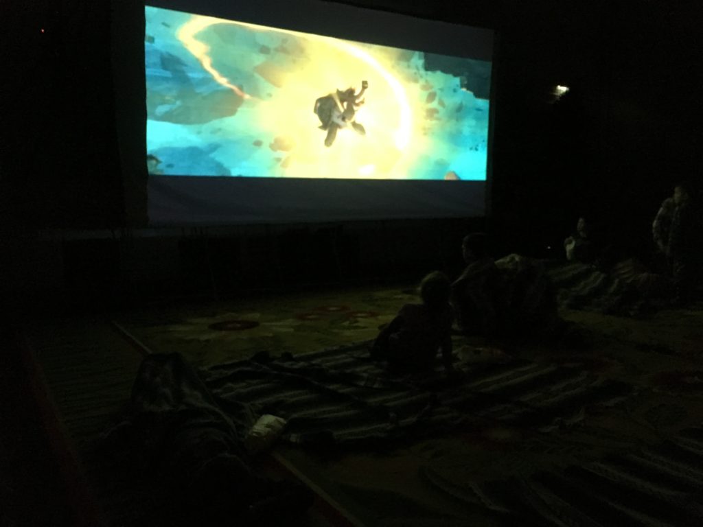 a group of people watching a movie