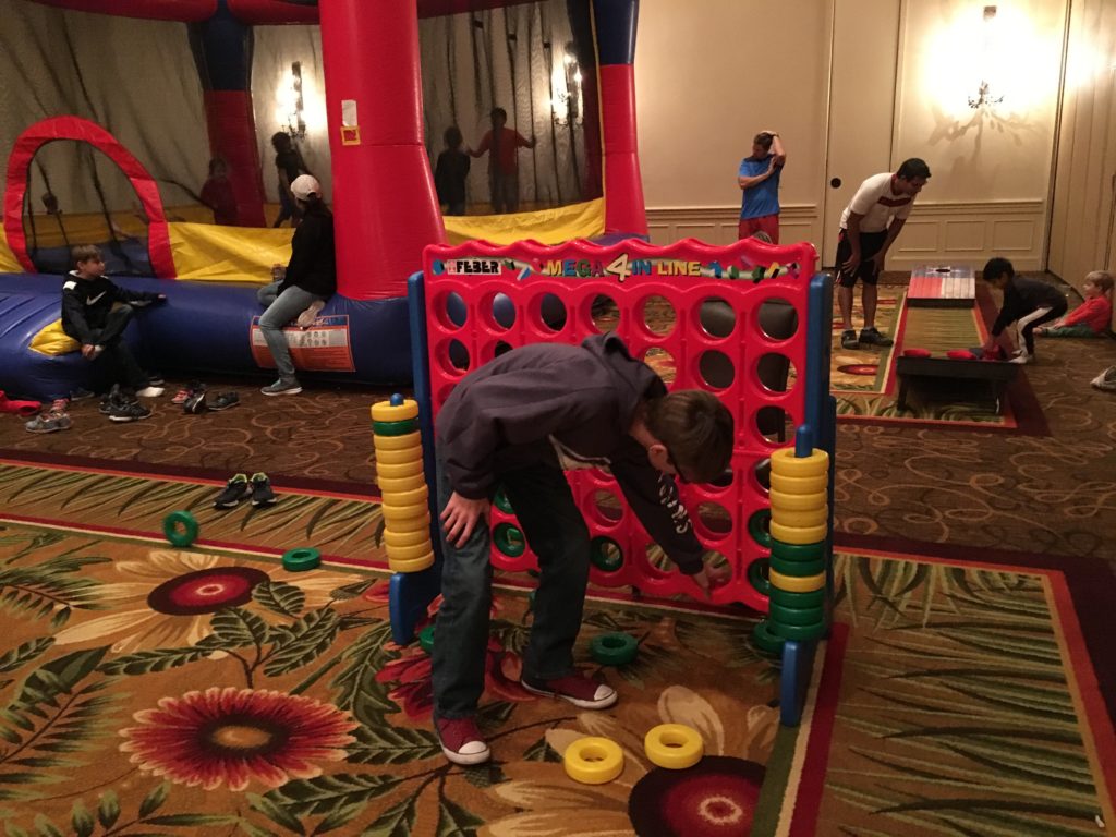 a boy playing with a game