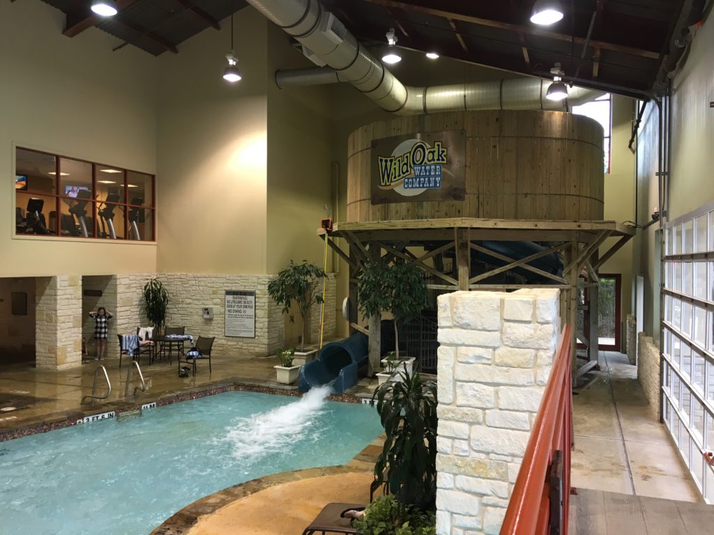 a indoor pool with a water slide