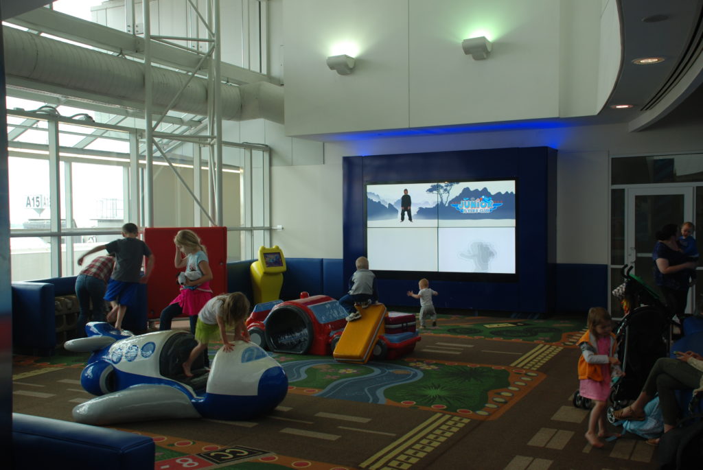 a group of kids playing in a playroom