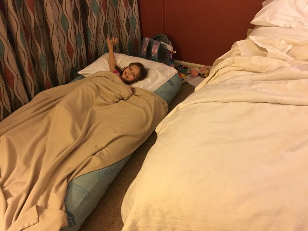 a girl lying on a bed