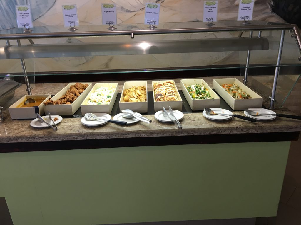 food in containers on a counter