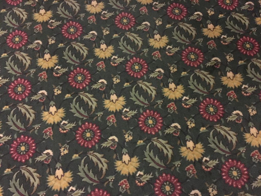 a carpet with flowers on it