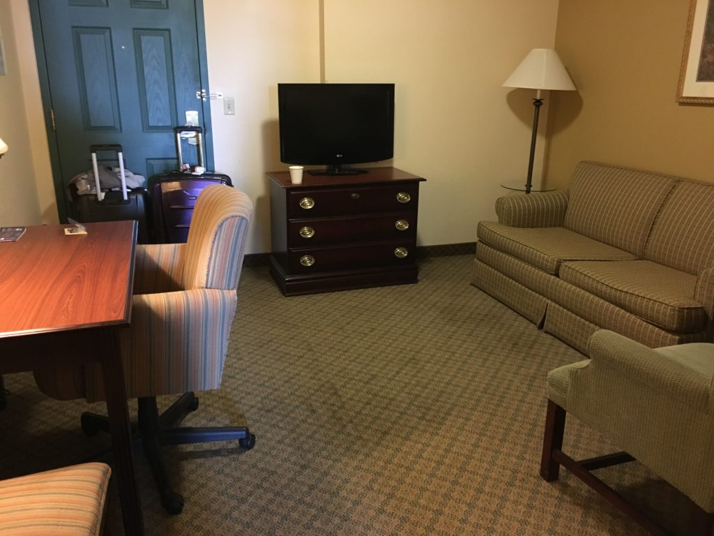 a room with a television and a couch