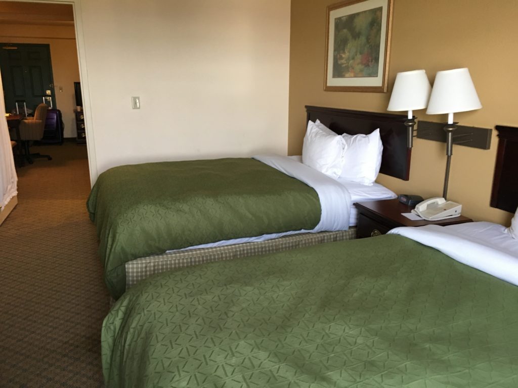 two beds in a hotel room