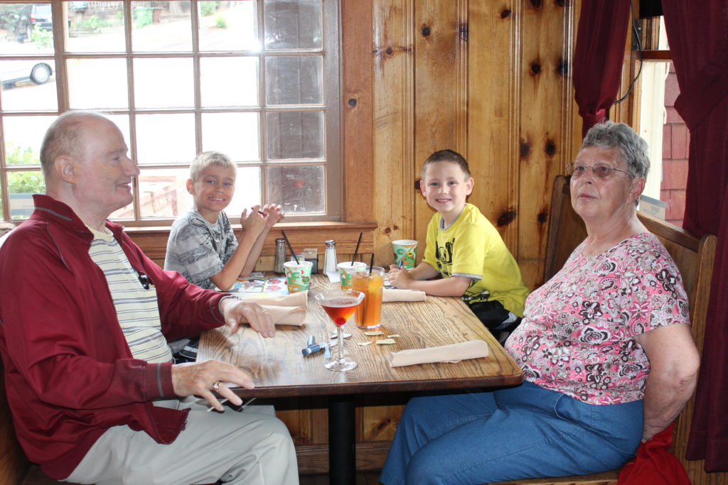 a group of people sitting at a table