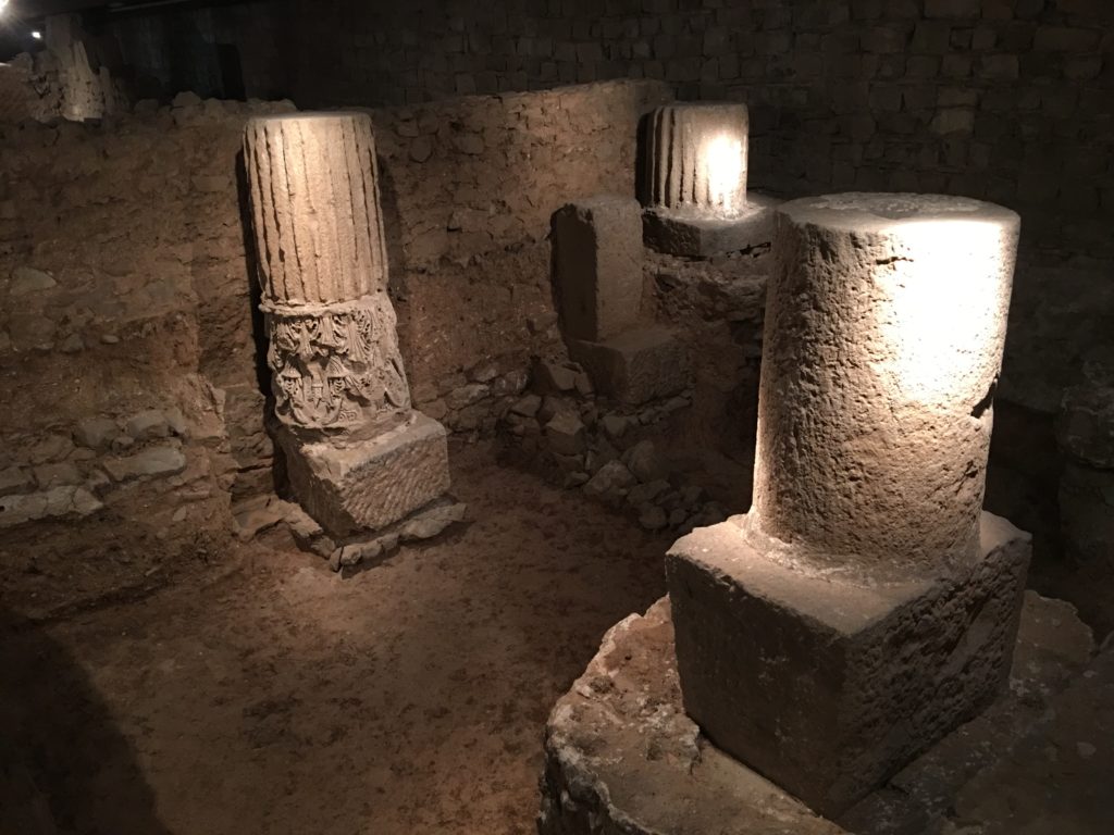 a stone pillars in a room