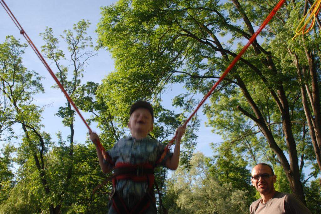 a boy on a rope
