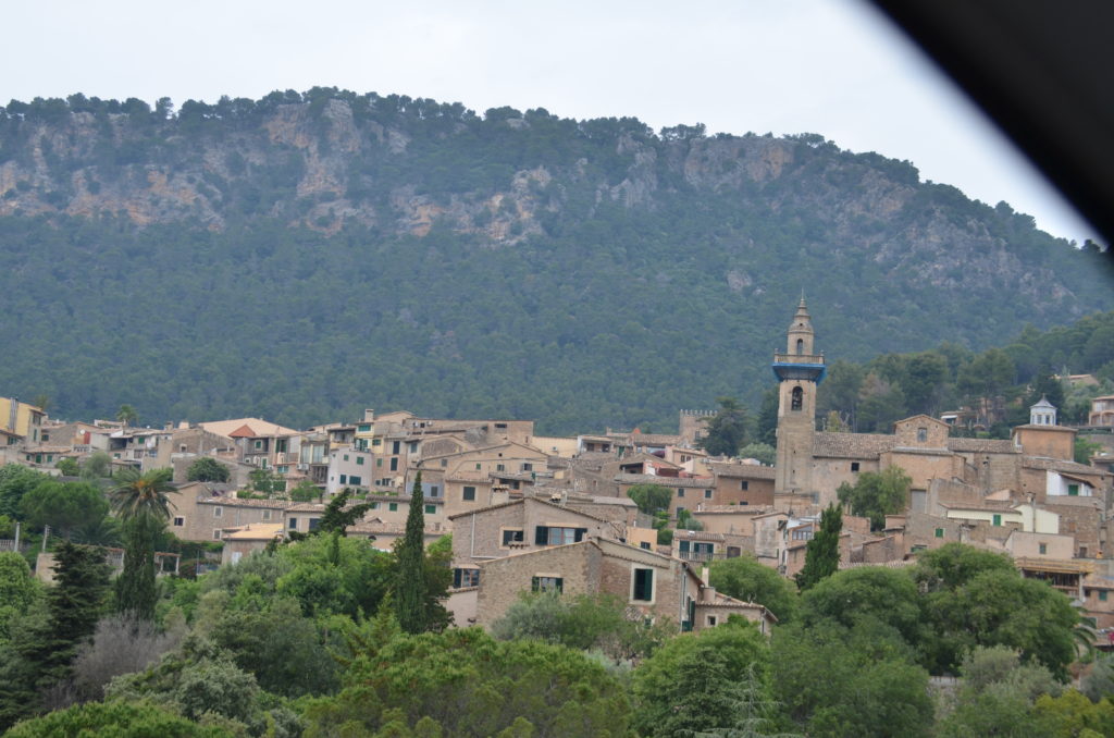 a town with a mountain in the background