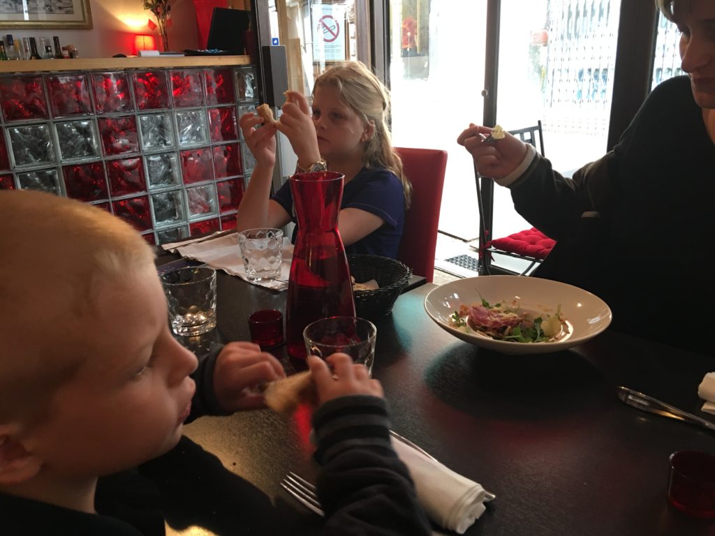 a group of people eating at a table