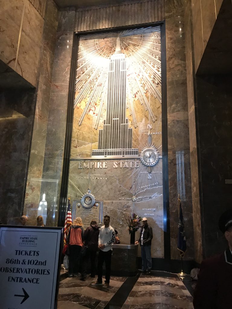 a group of people standing in front of a building