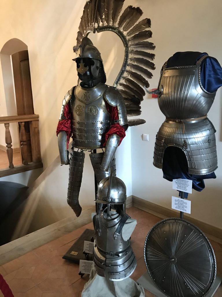 a group of armors on display