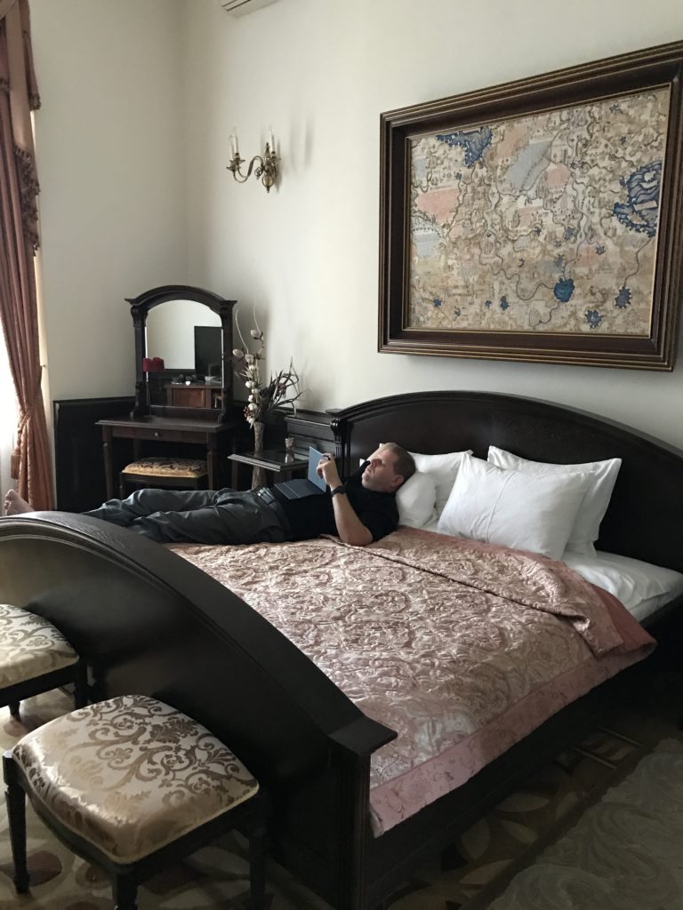 a man lying on a bed