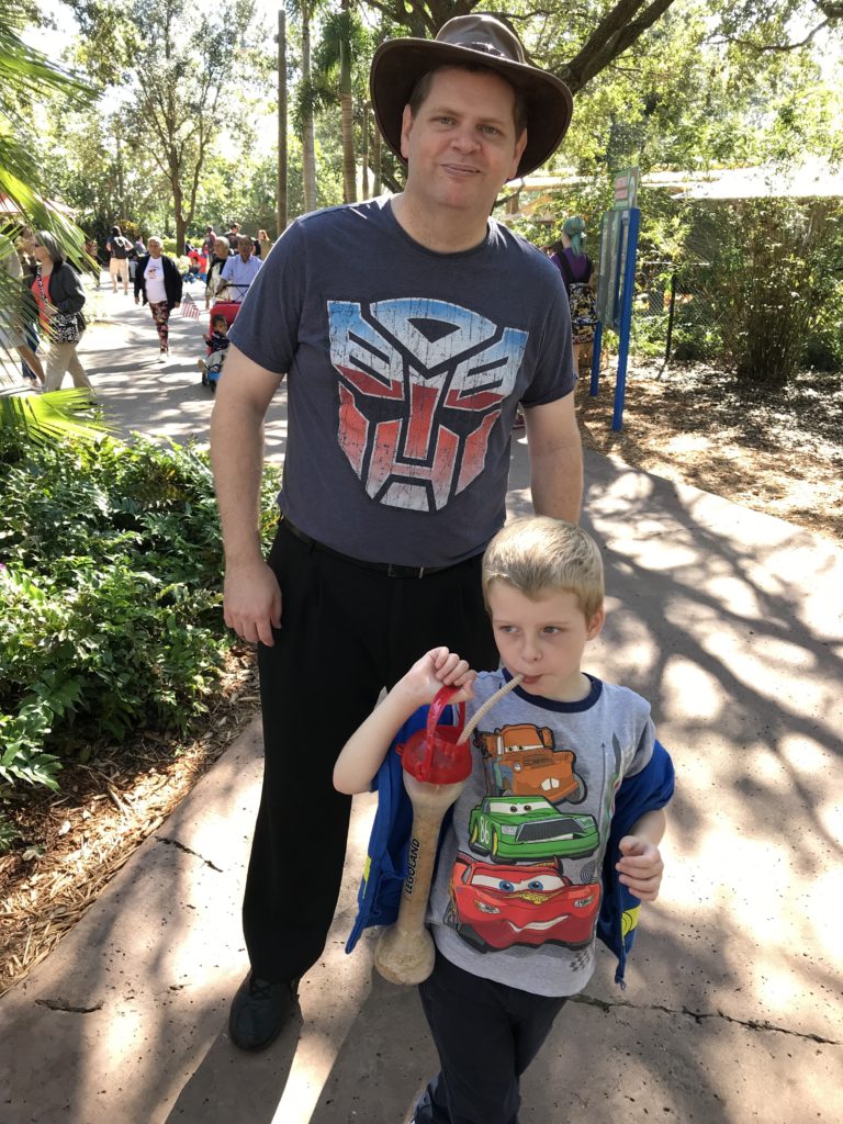a man and boy posing for a picture