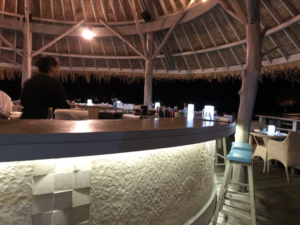 a man sitting at a bar