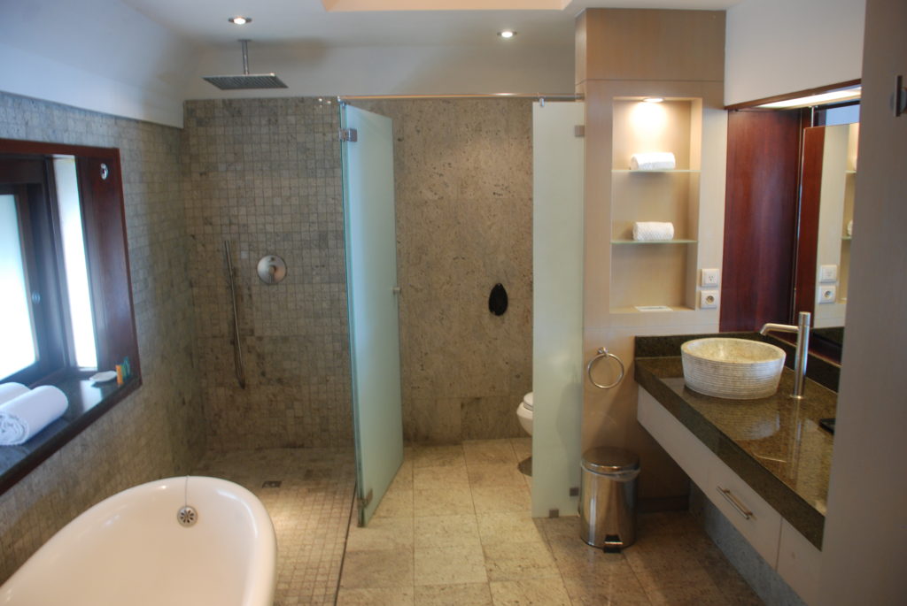 a bathroom with a sink and shower