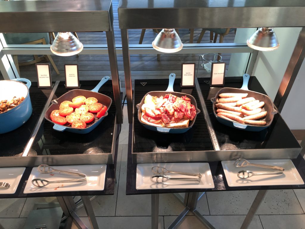 a group of pans with food in them