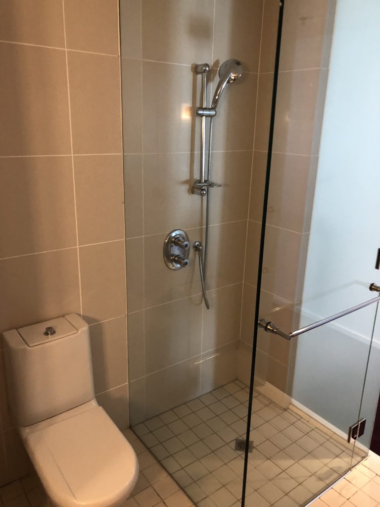 a shower with a glass door