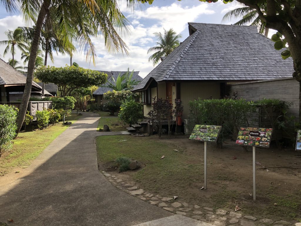 a house with signs in front of a house