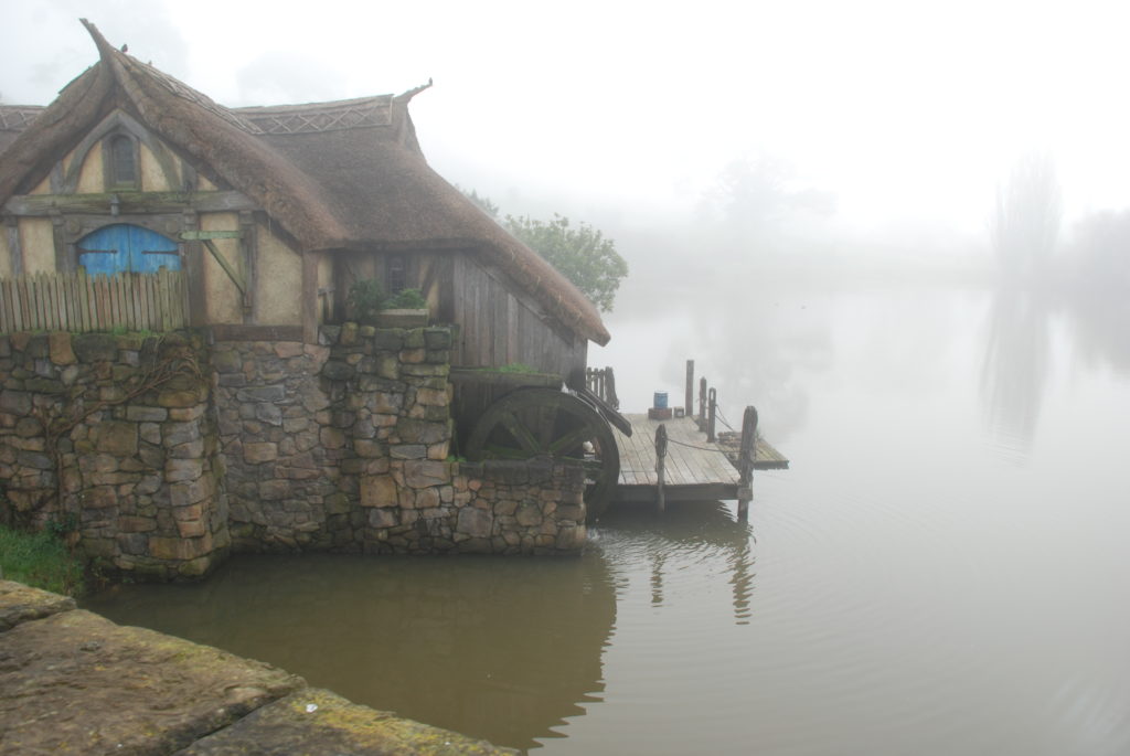a water wheel on a dock