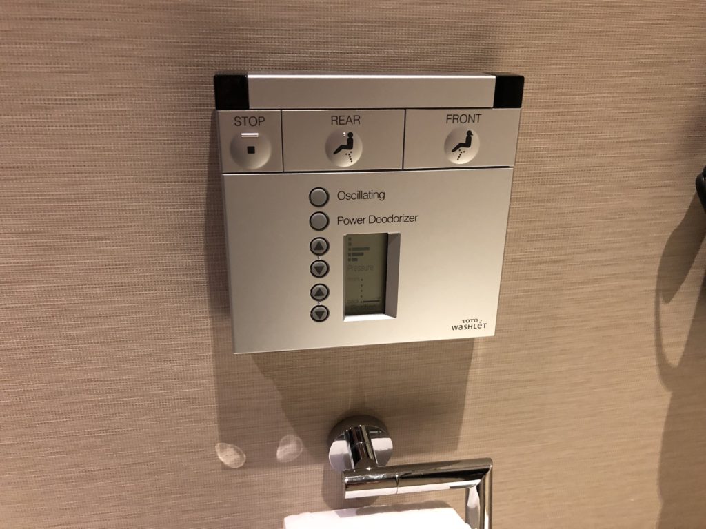 a toilet paper holder and a device