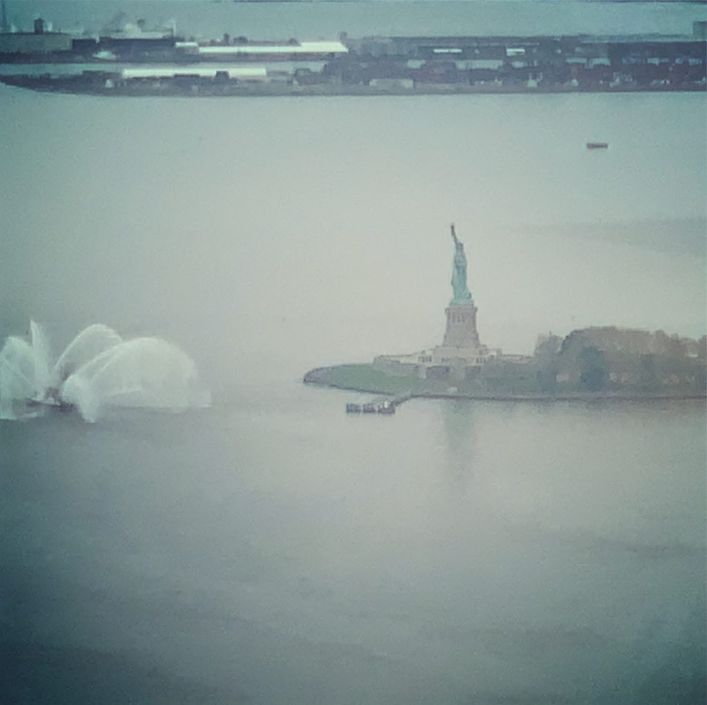 a statue of liberty in the water
