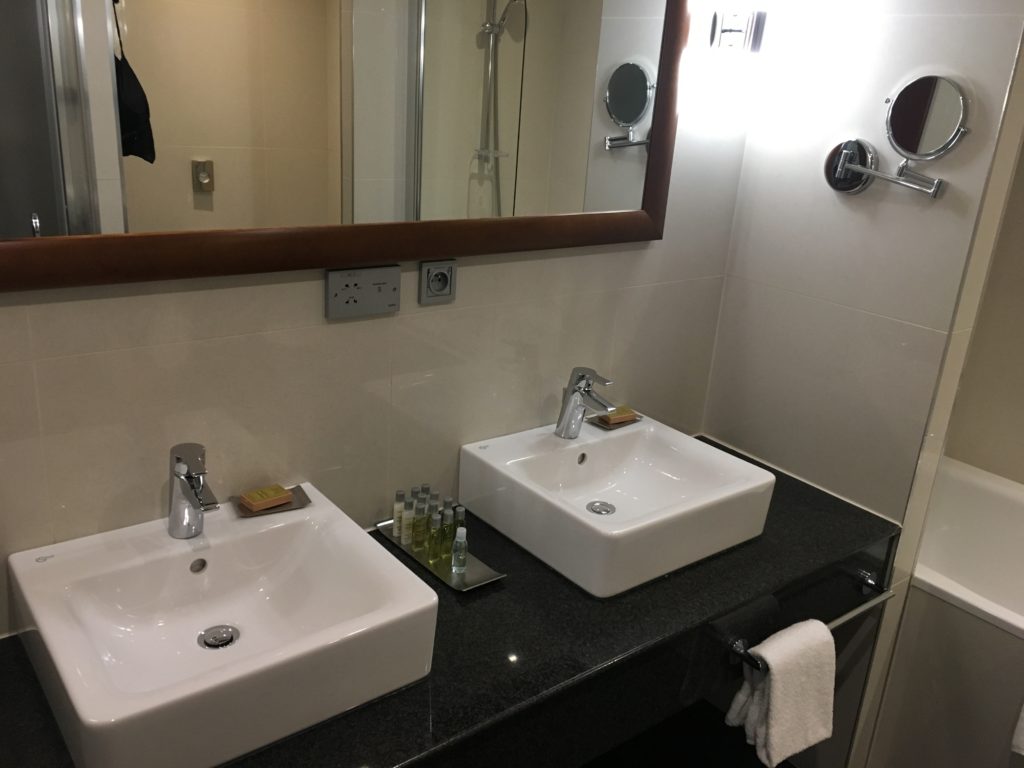 a bathroom with two sinks