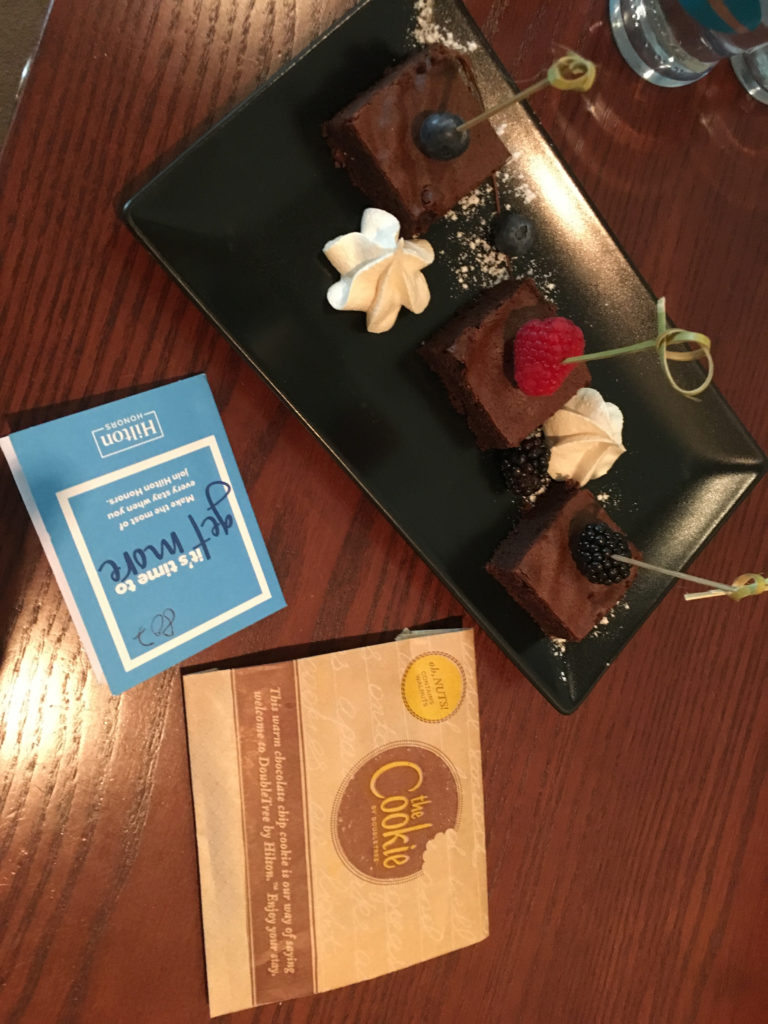 a plate of desserts on a table