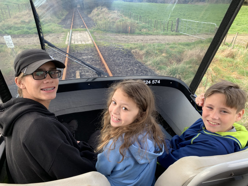 a group of people in a train car