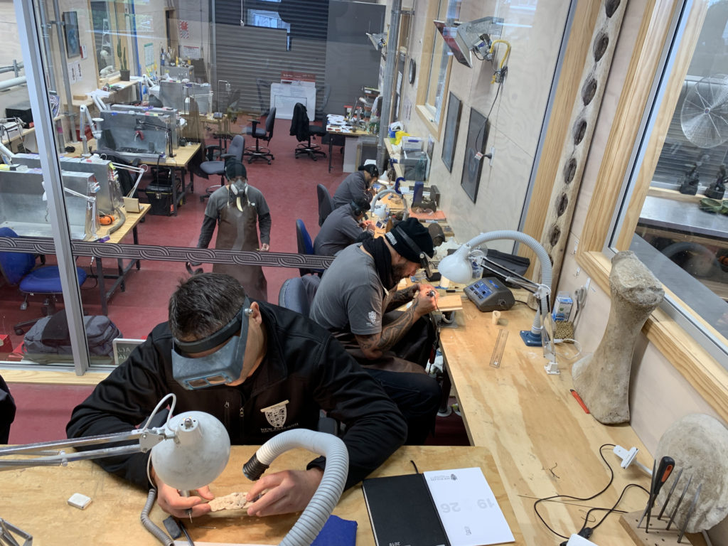 a group of people working in a lab