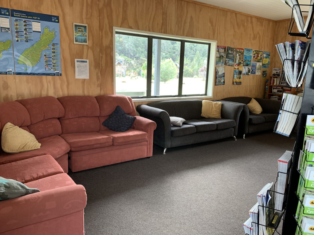 a room with couches and a window