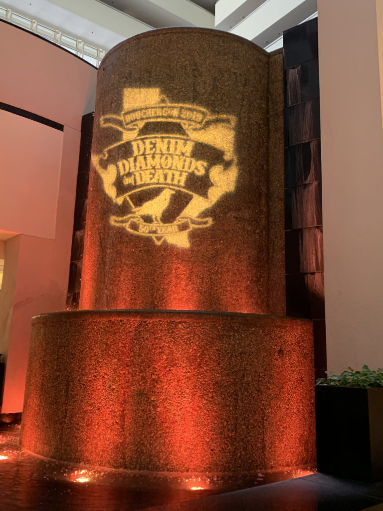 a pillar with a logo on it