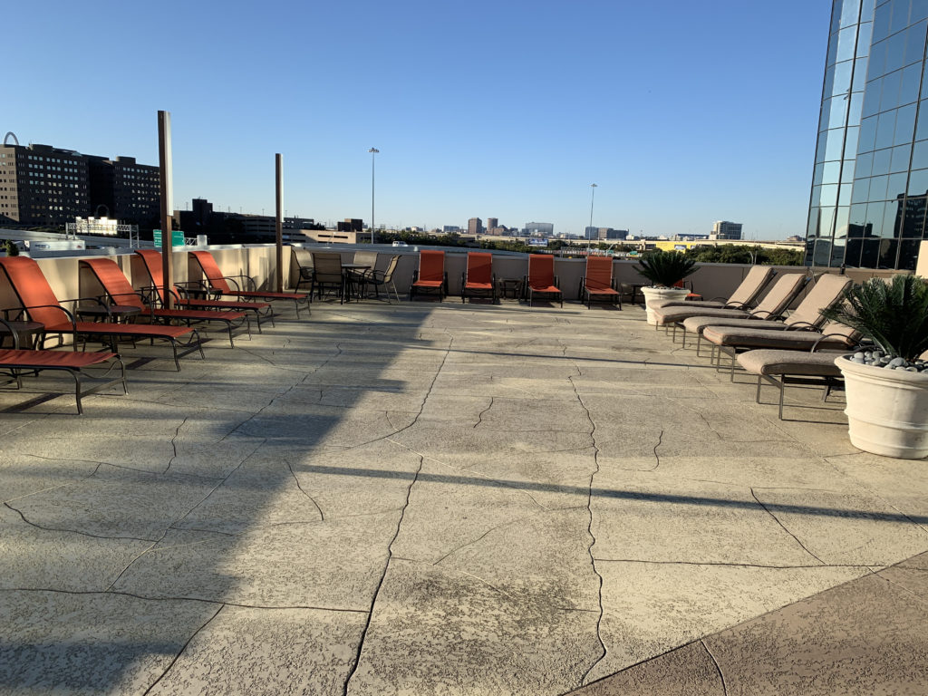a group of chairs on a rooftop