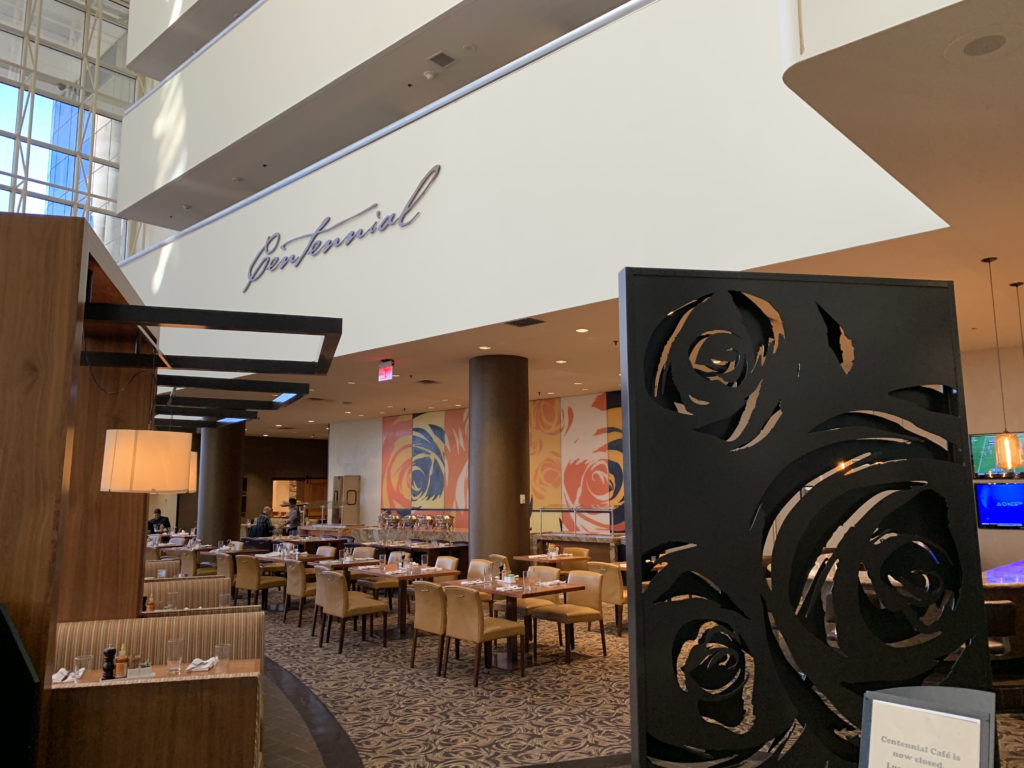 a restaurant with tables and chairs