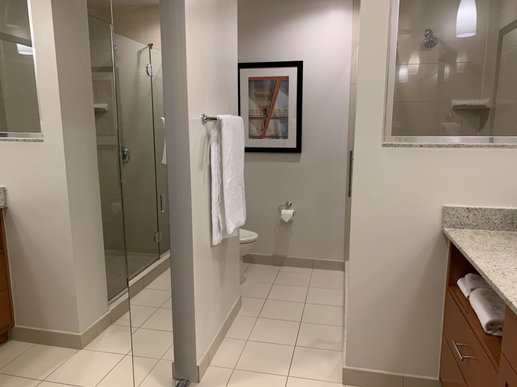 a bathroom with a toilet and shower